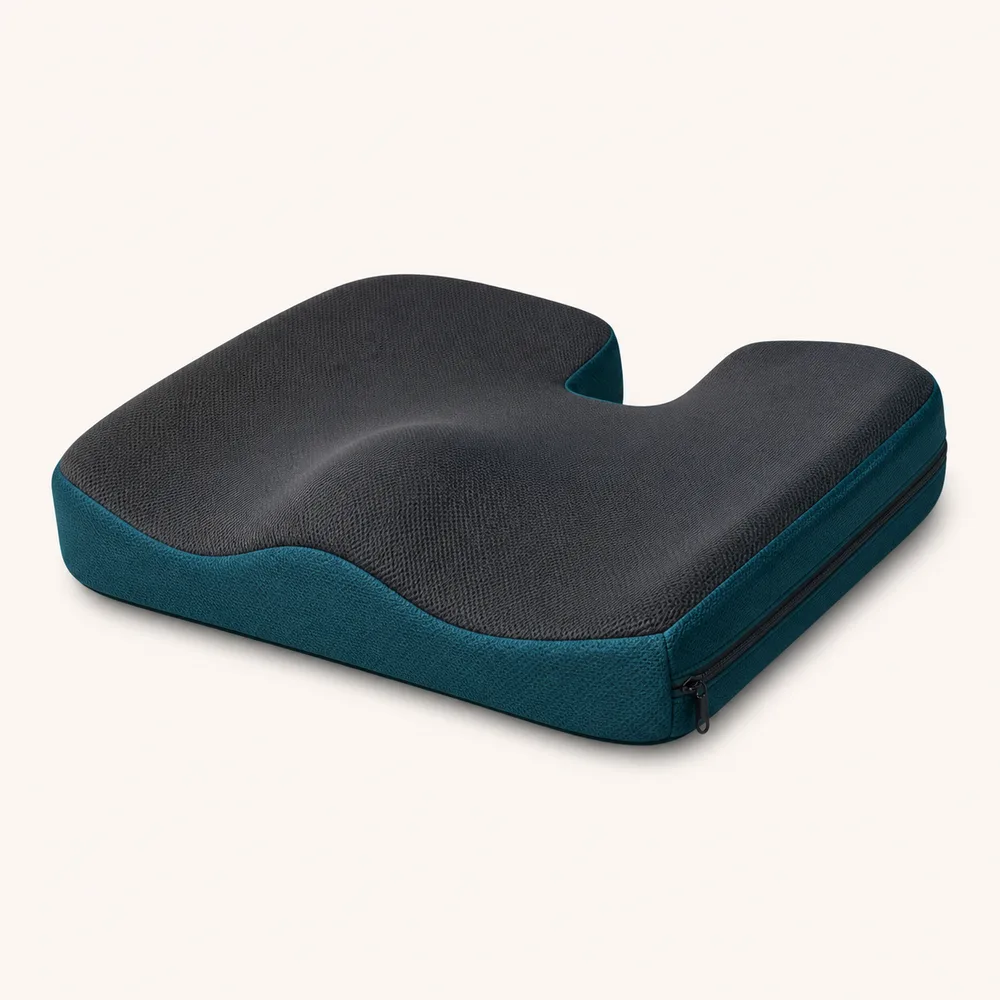 Contoured charcoal and teal wheelchair pressure-care cushion